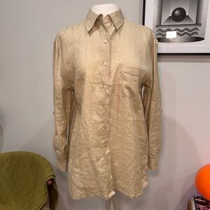 Tan button-up shirt with a relaxed fit